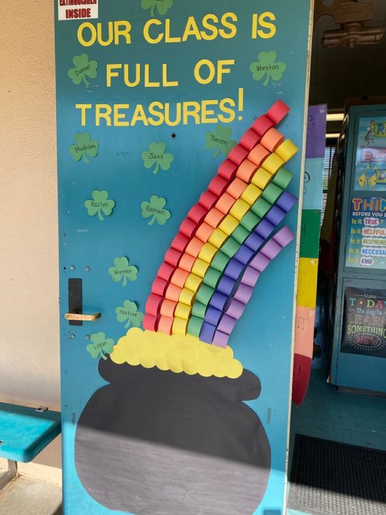 St. Patrick’s Day-inspired classroom door with a 3D rainbow leading to a pot of gold.