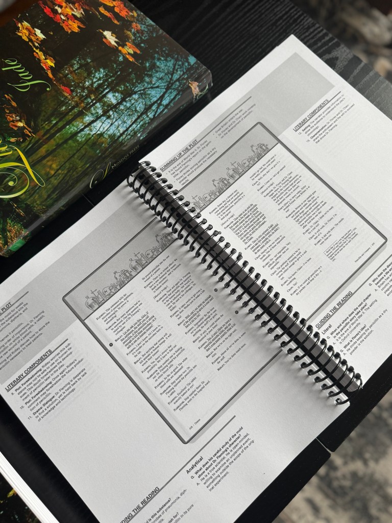 Open book featuring Mosdos Press Literature: Jade, with pages showing structured teaching guides, including plot summaries and literary components.