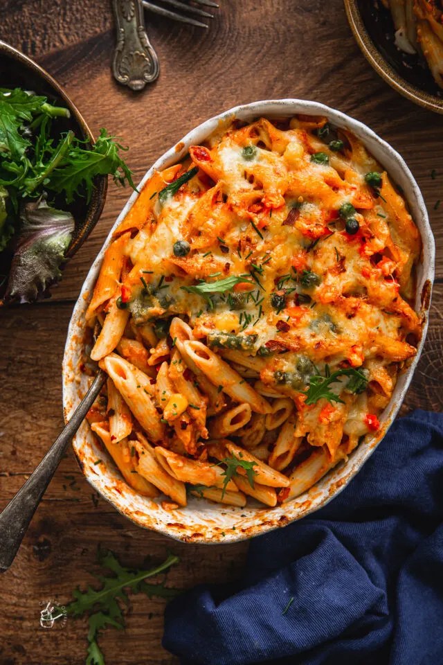 Air fryer pasta bake with melted cheese and pasta in a small baking dish