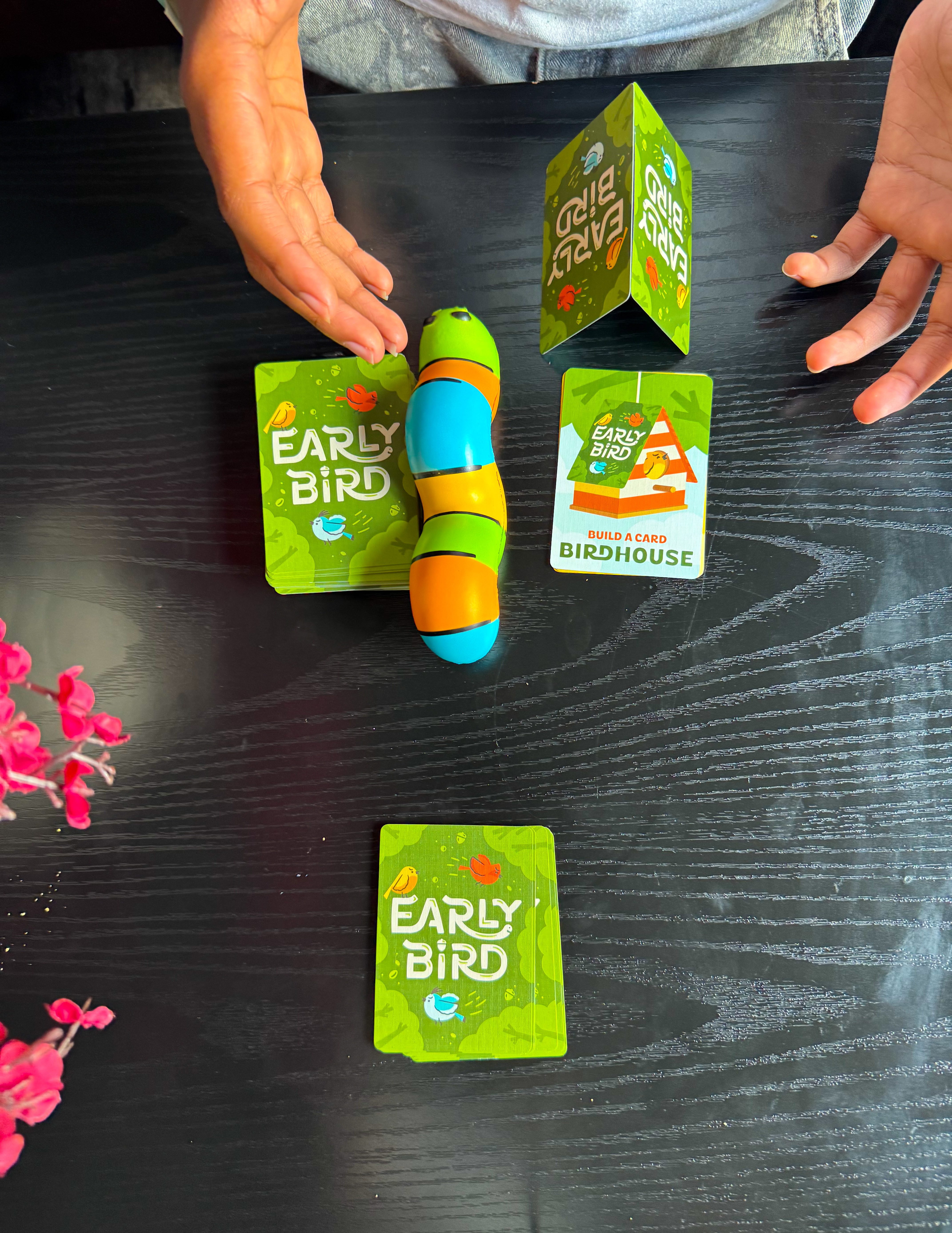 Child playing the Build a Birdhouse challenge card in the Early Bird game