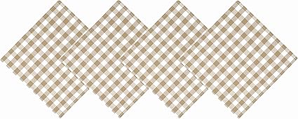 A beige and white checkered tablecloth laid out in a diamond pattern, creating a stylish and cozy atmosphere for a Thanksgiving table setting.