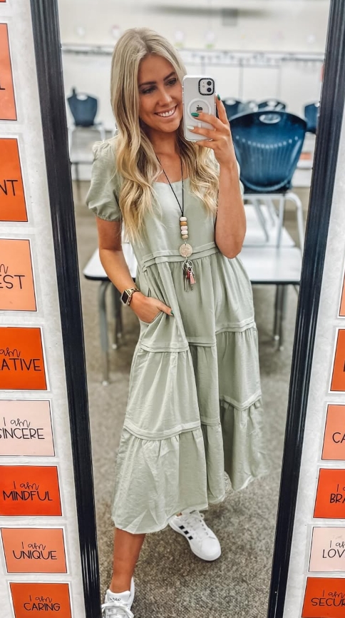 spring teacher outfit with green tiered dress and sneakers