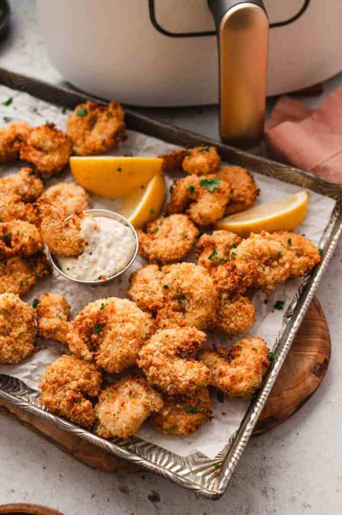 Crispy popcorn shrimp served with creamy Parmesan peppercorn dipping sauce