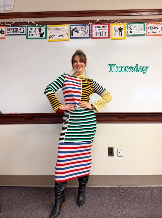 spring teacher outfit with colorful striped midi dress and boots