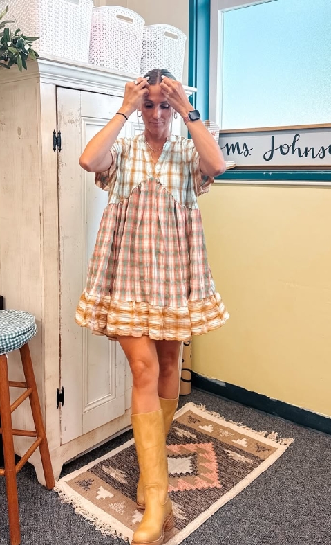 spring teacher outfit with plaid dress and boots