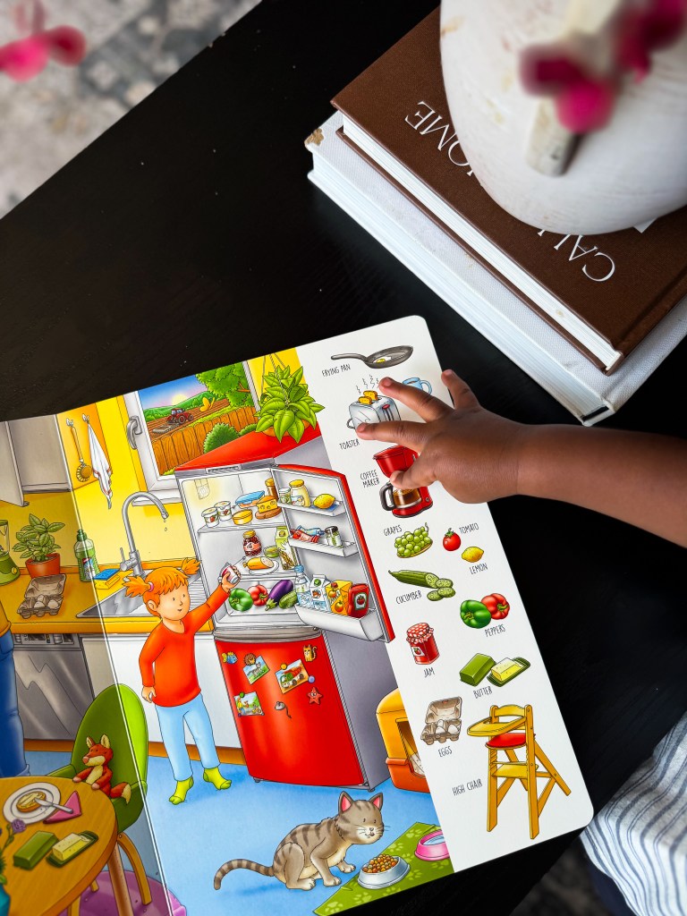 Preschooler using My First 100 Words for kindergarten learning and vocabulary