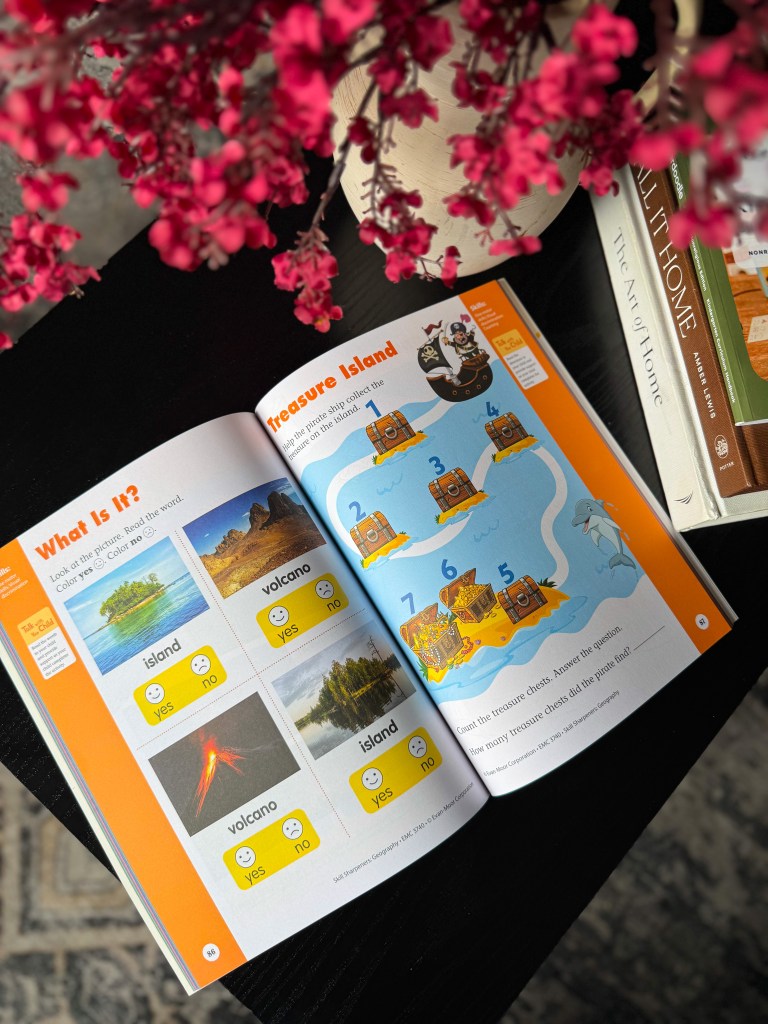 Inside Skill Sharpeners Geography Kindergarten workbook featuring an island and treasure map activity.