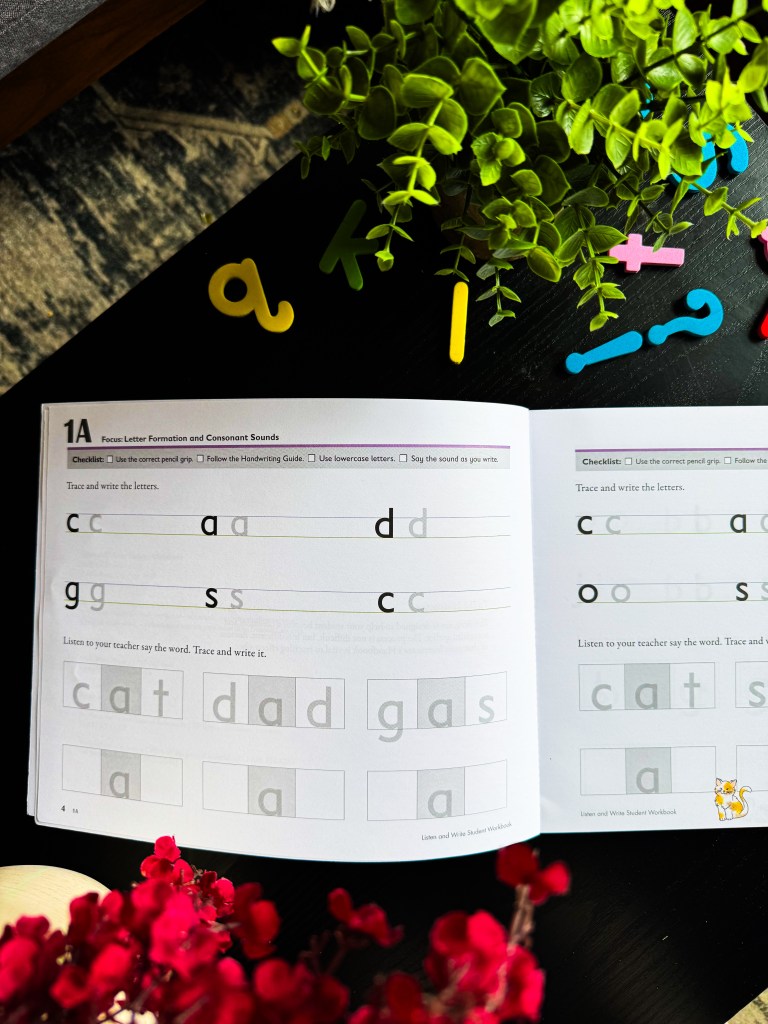 Kindergarten spelling and handwriting worksheets from Spelling You See Level A featuring lowercase letter tracing and three-letter words.