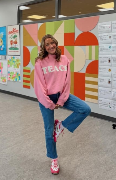 casual teacher outfit with teacher sweatshirt and jeans