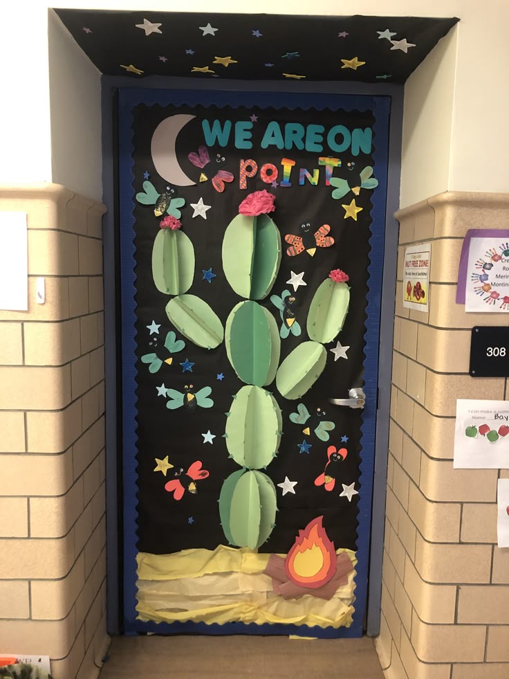we are on point cactus classroom door with desert theme and bright colors