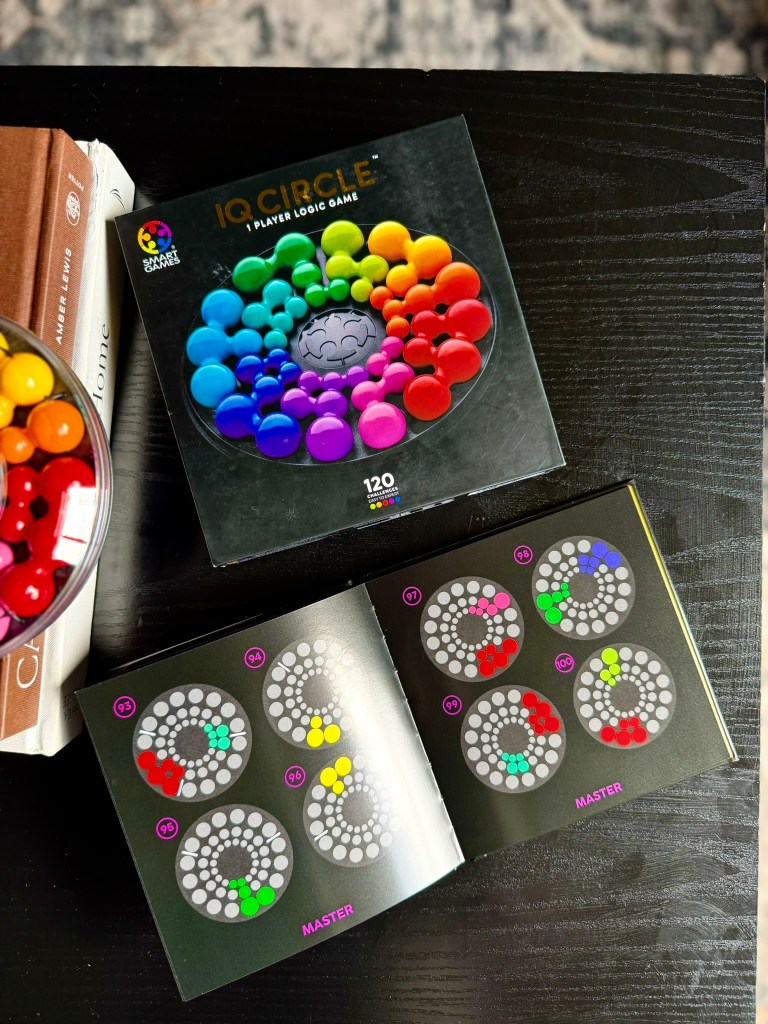 IQ Circle challenge booklet open to master-level logic puzzles