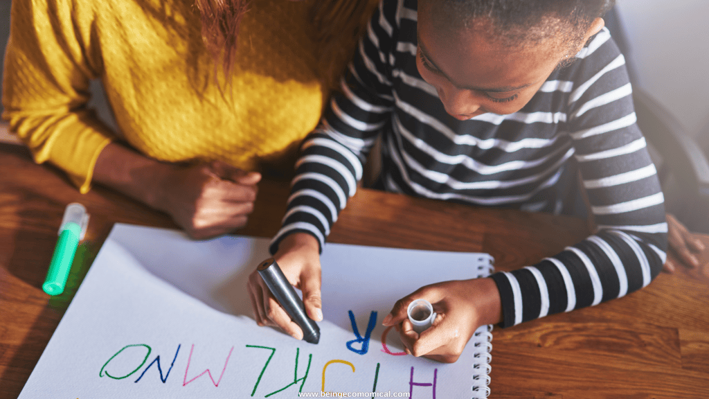 Four-year-old practicing letters and writing with markers during a preschool learning activity.
