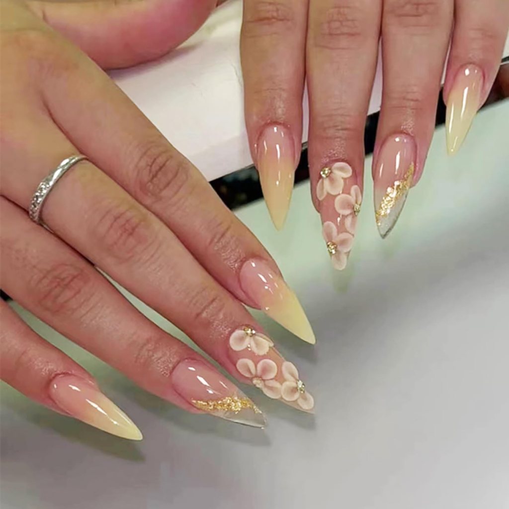 Butter yellow ombre almond nails with soft pastel fade and glossy elegant manicure finish