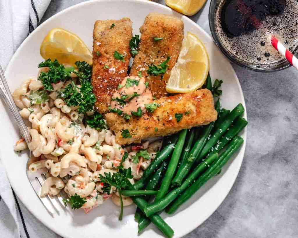 Crispy fried mahi mahi fillets with lemon for a simple summer seafood dinner.