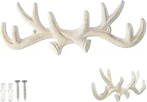 A decorative white antler wall hook with multiple points, showcasing its rustic design and provided screws for installation.