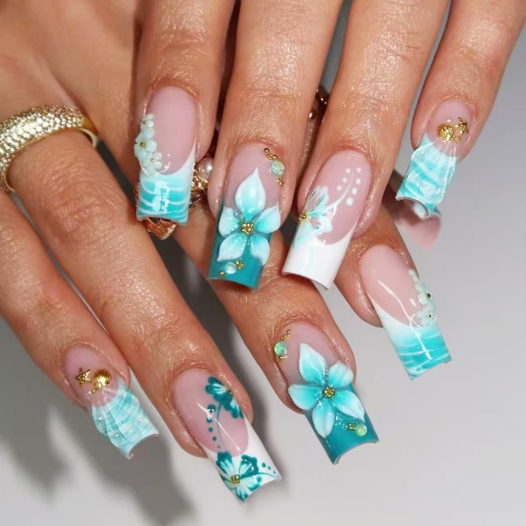 Turquoise tropical beach nails with hibiscus flowers, glossy summer nail art, and ocean-inspired details
