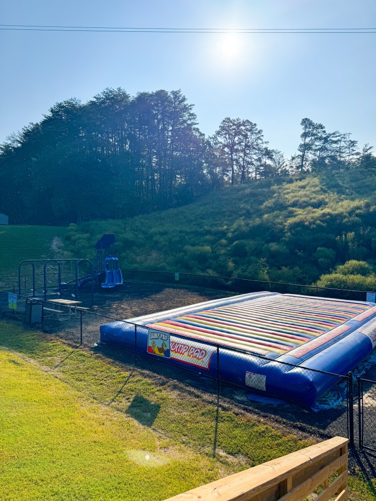 Jump pad and playground area at Jellystone Park Pigeon Forge