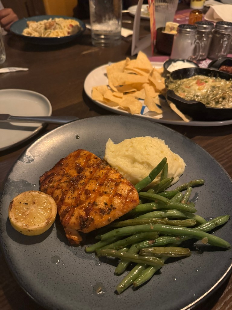 Fireside restuarant salmon dinner with mashed potatoes and green beans at Great Wolf Lodge in Grapevine, Texas