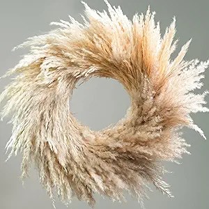 A decorative pampas grass wreath in neutral tones, showcasing a natural and elegant design.