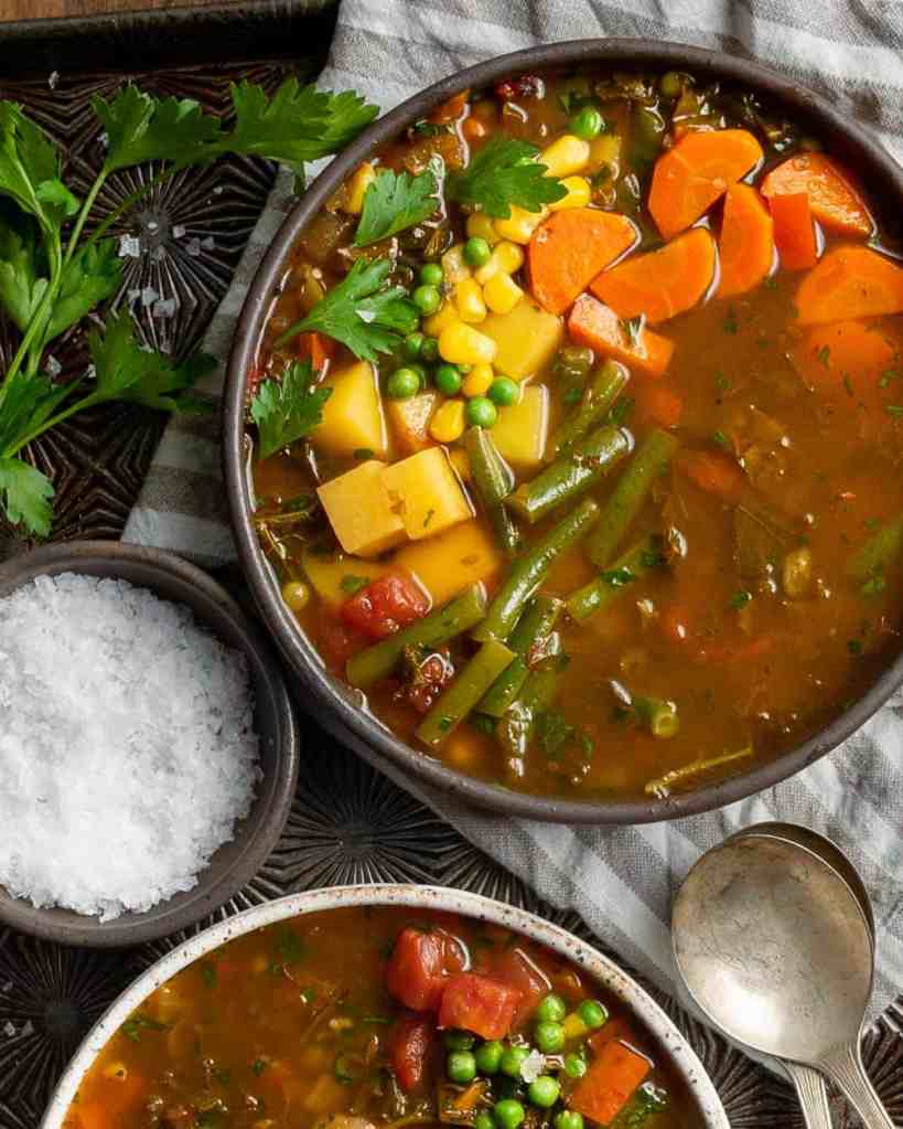 Classic homemade vegetable soup filled with fresh garden vegetables in a tomato broth