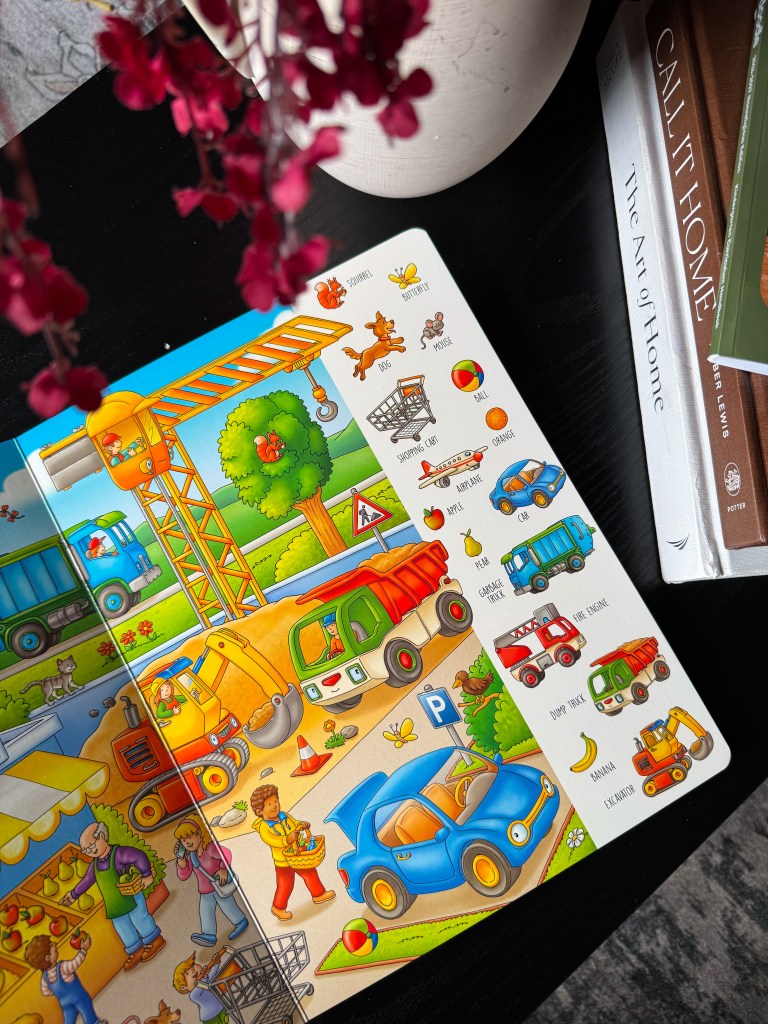 Inside My First 100 Words book with colorful vehicles, animals and everyday vocabulary.
