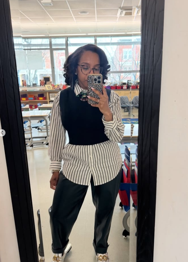 teacher outfit with striped button down and black vest