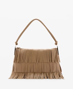 A tan fringe handbag with a single shoulder strap, displayed against a plain white background.