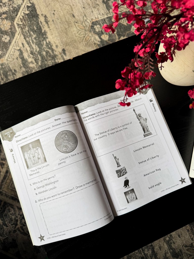 Inside 180 Days of Social Studies Kindergarten workbook with Lincoln Memorial and penny history activities.