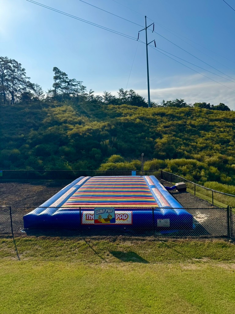 Large inflatable jump pad at Jellystone Park Pigeon Forge