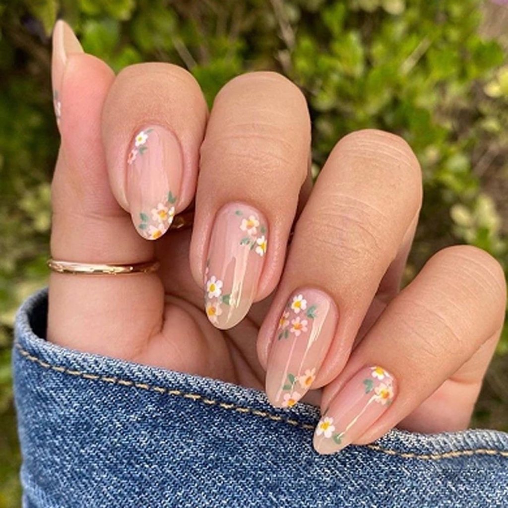 short pink hibiscus nails with gold accents and tropical design
