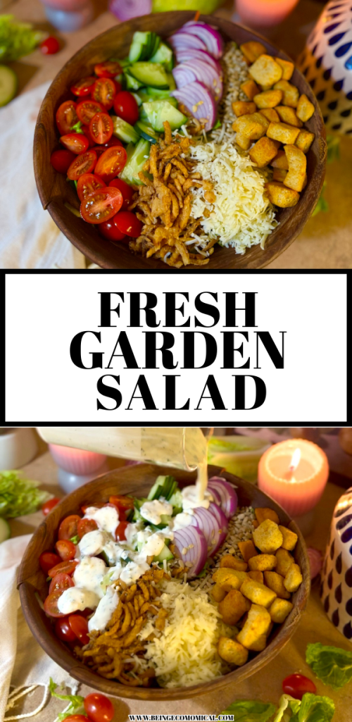 A wooden bowl filled with a fresh garden salad, featuring cherry tomatoes, cucumber, red onion, crispy fried onions, shredded cheese, and golden croutons, with a creamy dressing being poured over the top.