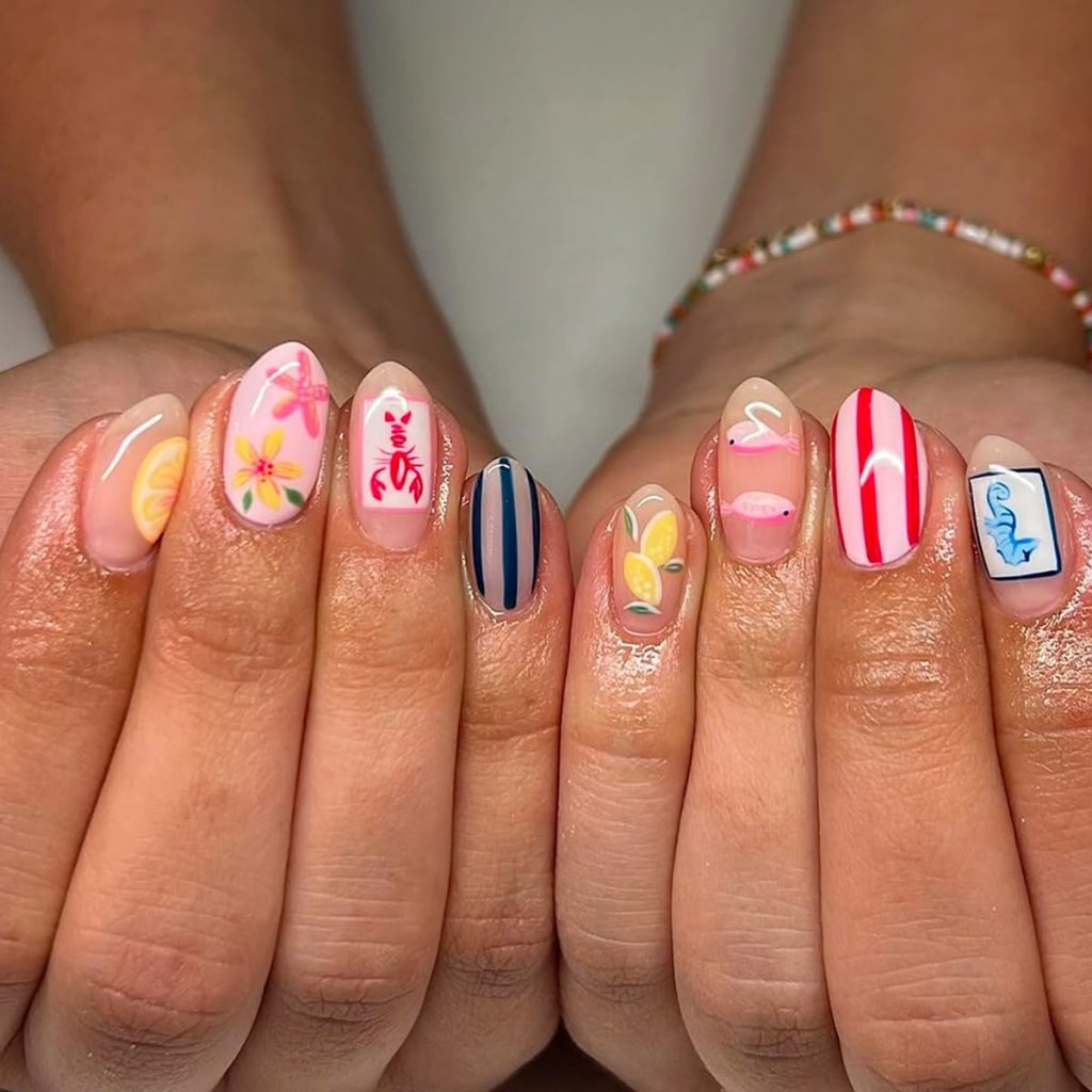 lemon and stripe summer nails with bright citrus nail art
