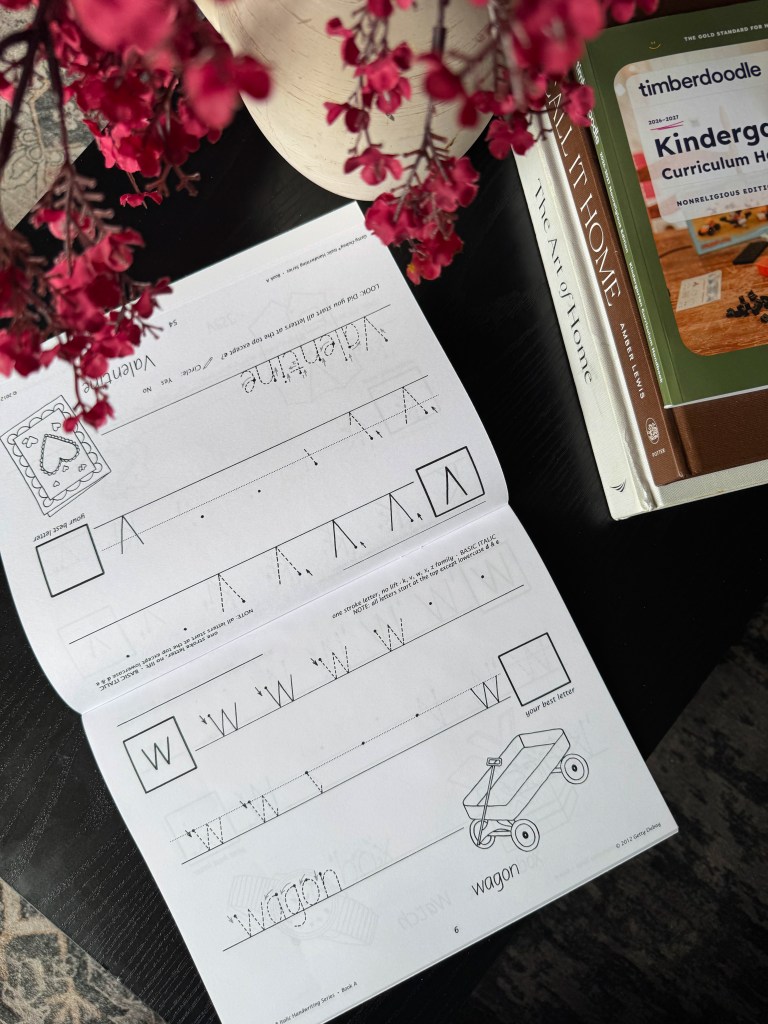 Inside Getty-Dubay Italic Handwriting workbook showing guided letter formation practice.