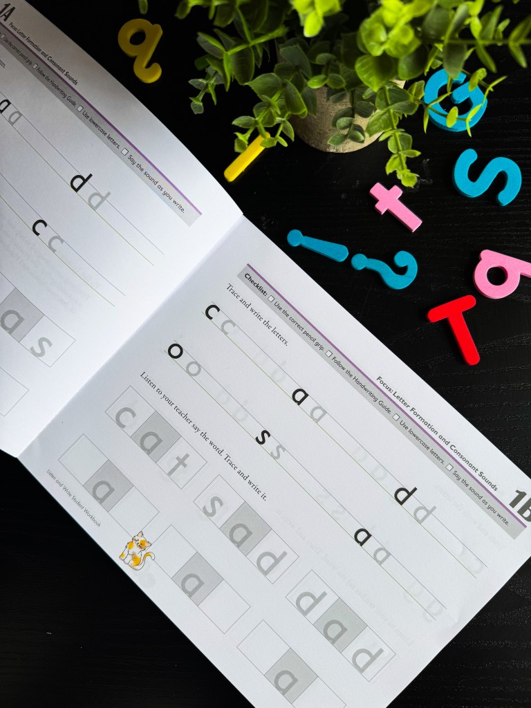 Close-up of Spelling You See Level A handwriting practice with lowercase letters and simple words for kindergarten students.