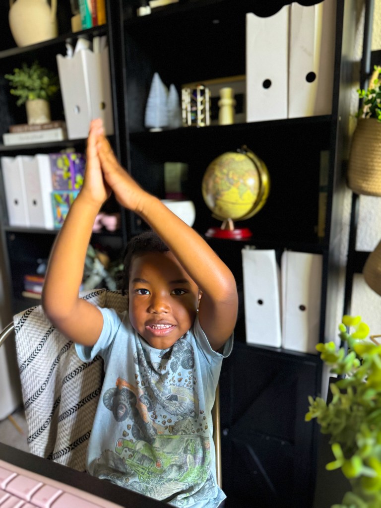 Child using movement during a kinesthetic kindergarten phonics learning activity
