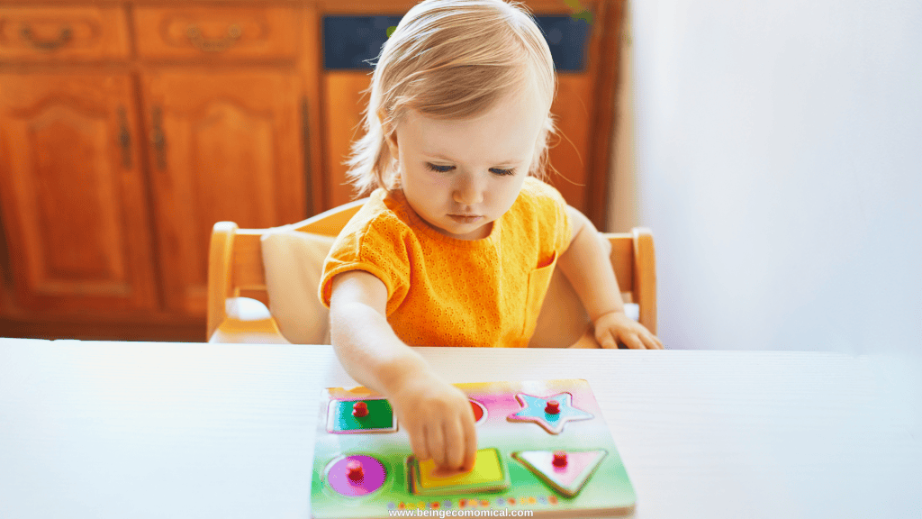 Wooden animal puzzle activity for 2 year olds during quiet play.