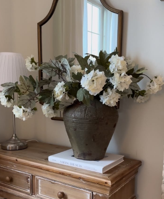spring home decor | spring decorating ideas | seasonal home decor | spring decor inspiration | light and airy home decor | spring centerpiece ideas | Easter home decor | farmhouse spring decor | rustic spring decor | vintage spring decor | cozy spring living room | spring entryway decor | spring floral arrangement | pastel home accents | cottagecore spring style | spring tablescape ideas | spring vignette styling | fresh flower home display | DIY spring decor | budget-friendly spring decorating