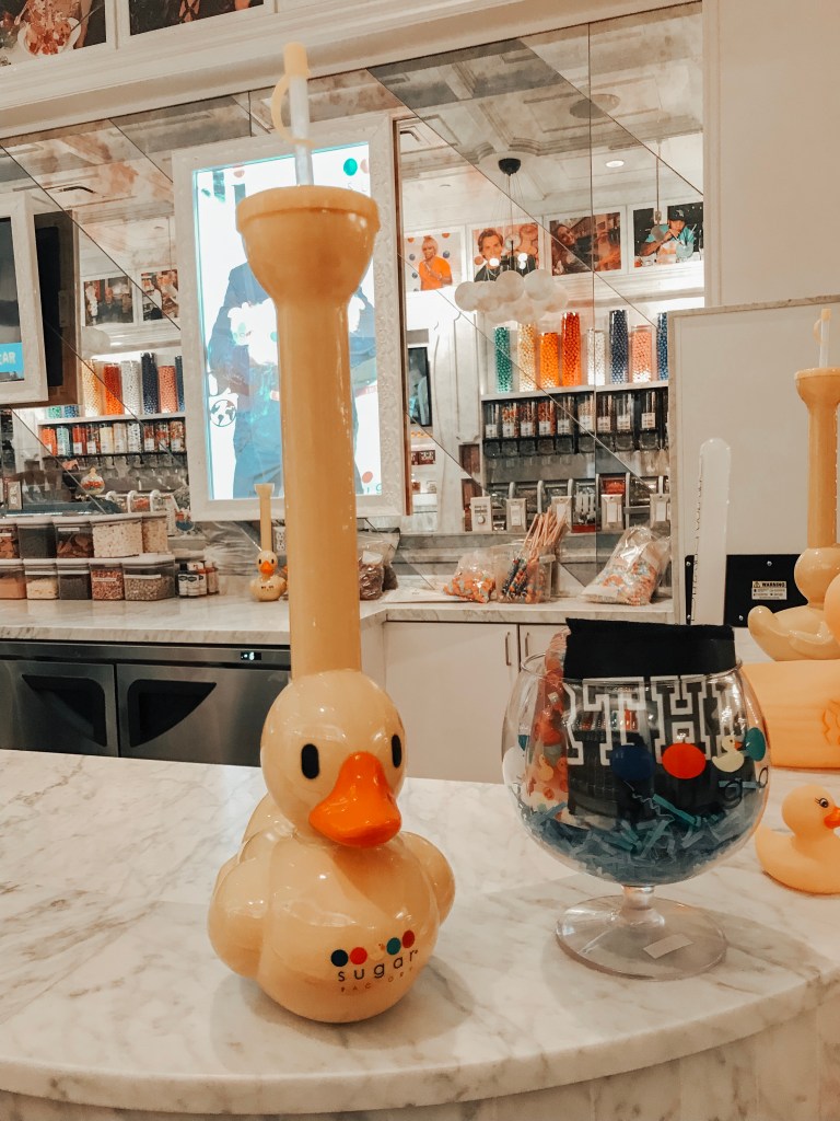 Colorful rubber duck souvenirs available inside Sugar Factory Biloxi.