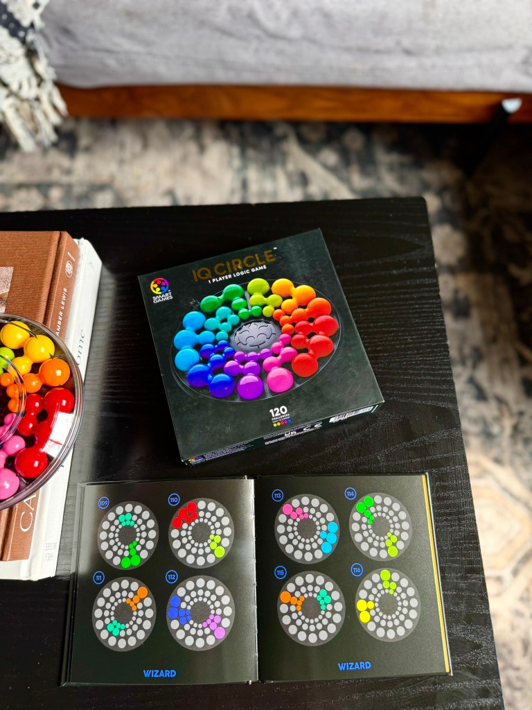 IQ Circle challenge booklet open to wizard-level puzzles
