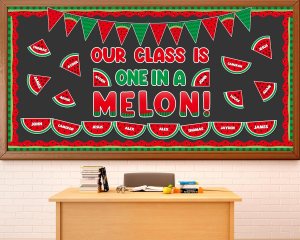 A classroom bulletin board decorated with a watermelon theme, featuring the phrase 'Our Class is One in a Melon!' in colorful letters, surrounded by watermelon slice graphics and festive bunting.