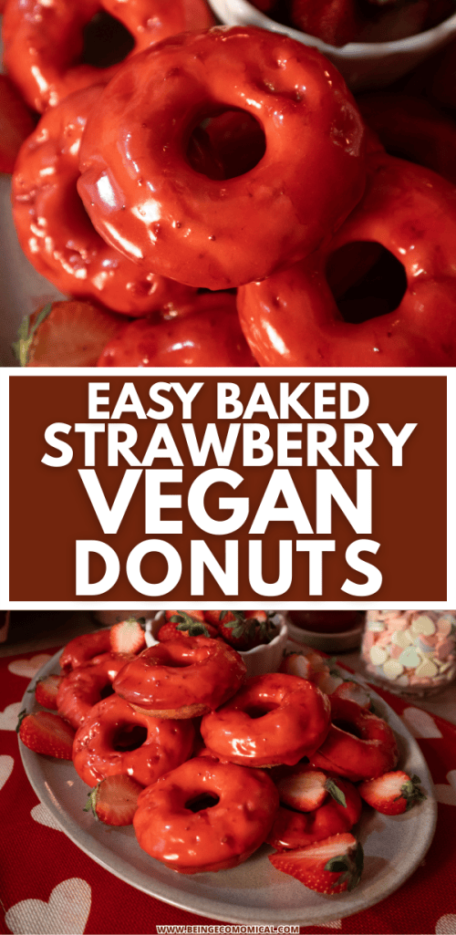 A close-up of glazed vegan donuts topped with a strawberry frosting, displayed alongside fresh strawberries on a white plate.