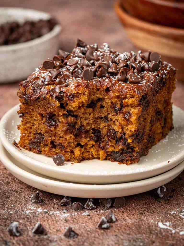 Homemade pumpkin spice cake studded with chocolate chips – easy autumn recipe.