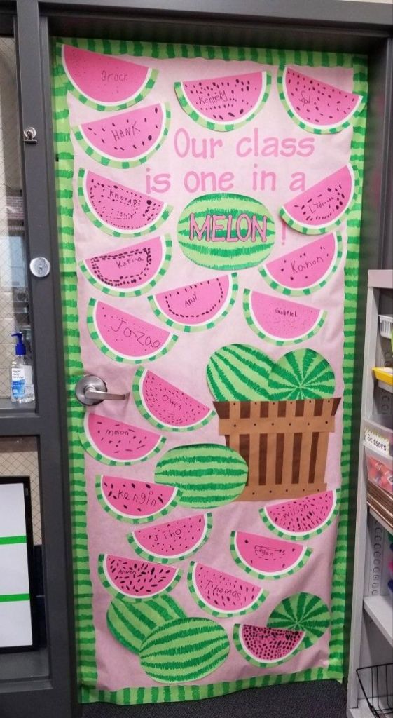 one in a melon classroom door with watermelon slices and student names