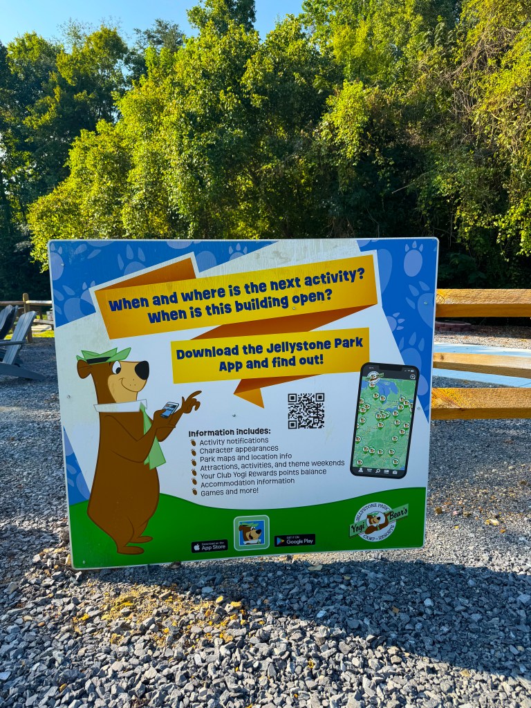 Jellystone Park app sign explaining activity schedules and park information