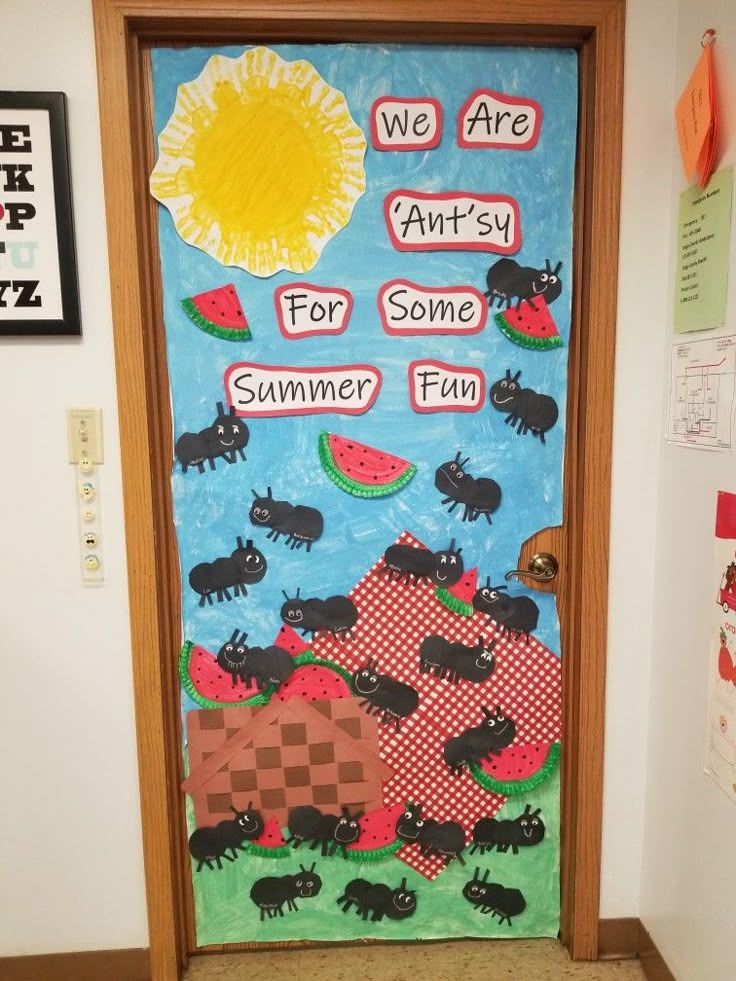watermelon themed classroom door with ants for summer decor