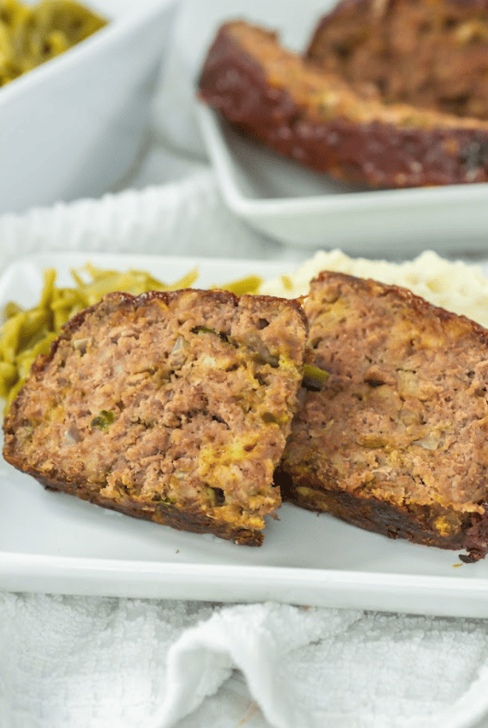 Copycat Cracker Barrel meatloaf with glaze served as a classic comfort meal