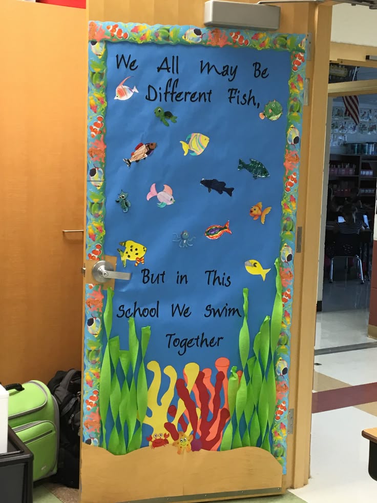 we all swim together classroom door with fish and ocean theme