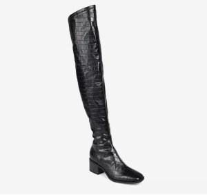 A stylish black over-the-knee boot with a crocodile pattern and a block heel, perfect for fall outfits.