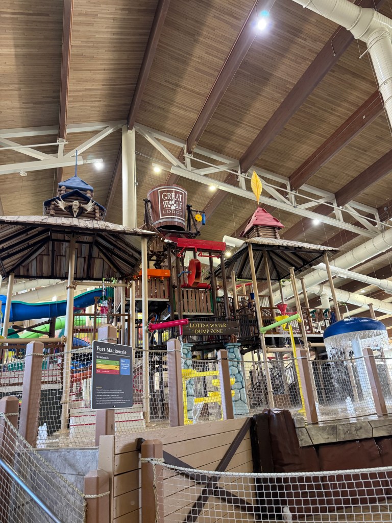 Indoor water park play structure at Great Wolf Lodge featuring multiple slides, water play zones, and a themed design.