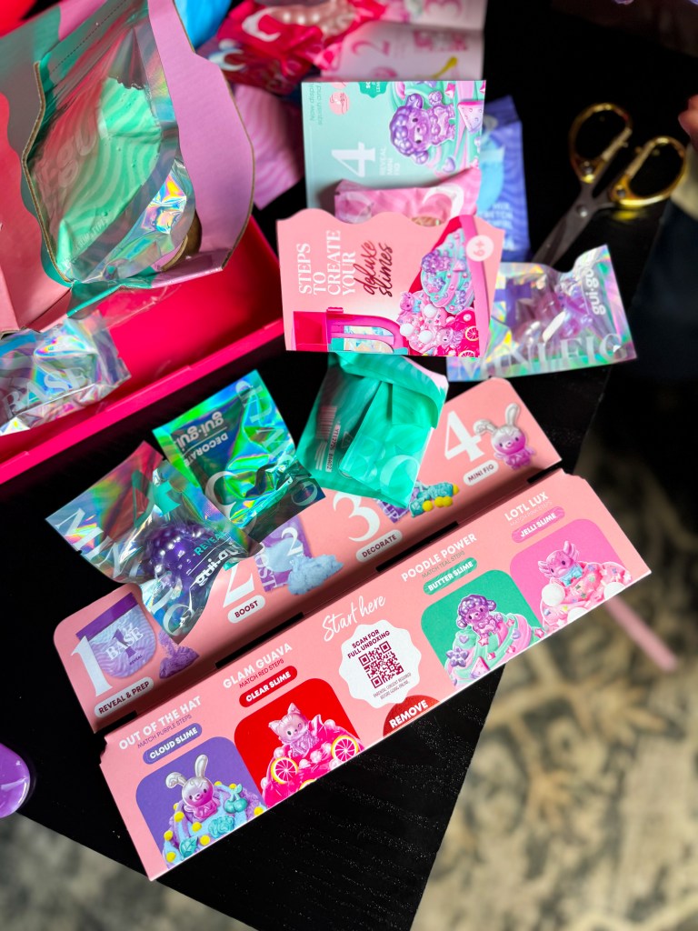 Colorful packaging for a slime-making kit with various components and instructions on creation steps, including different types of slime like cloud and jelly slimes.